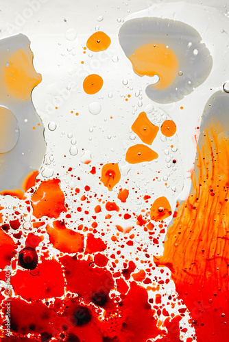 splash liquid vibrant shapes red orange and black 