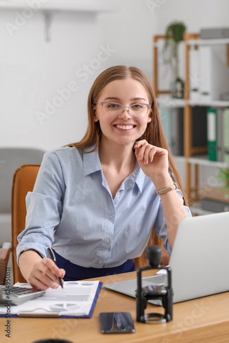 Female accountant working a...