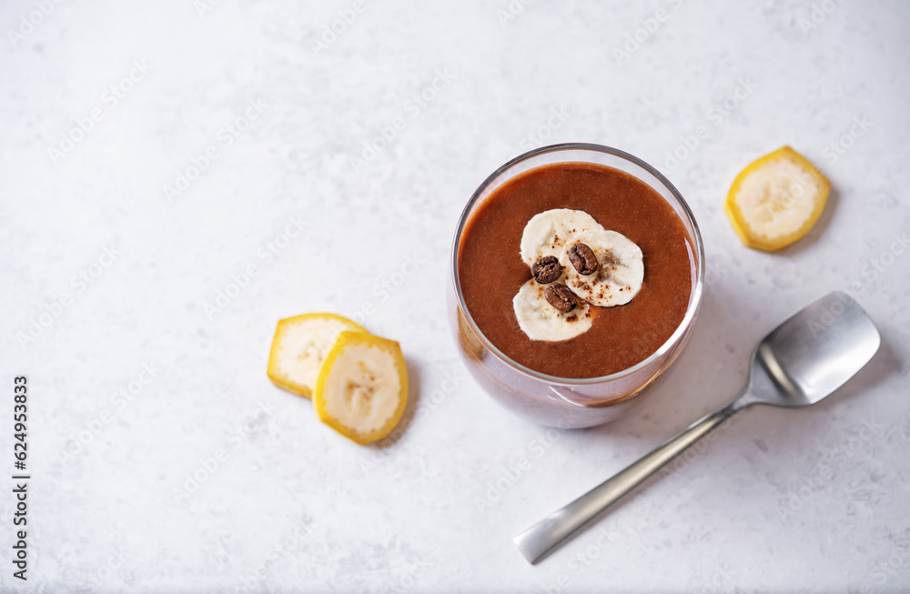 Coffee banana smoothie in a glass Coffee banana smoothie in a glass