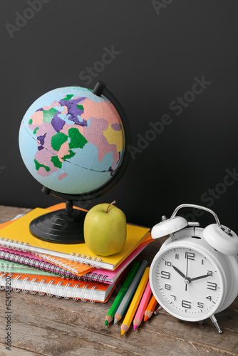 School supplies with globe,...