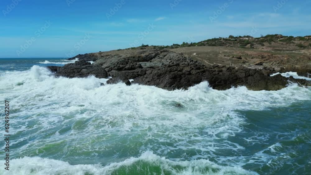 Large Ocean Beautiful Wave, Extreme wave crushing coast, Big ocean Beautiful wave, Amazing wave force breaking through dangerous rocks. Ocean Waves Crashing Against Rocks And Cliffs. Vietnam, Asia 4K Large Ocean Beautiful Wave, Extreme wave crushing coast, Big ocean Beautiful wave, Amazing wave force breaking through dangerous rocks. Ocean Waves Crashing Against Rocks And Cliffs. Vietnam, Asia 4K