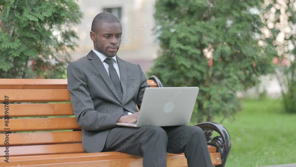 African Businessman Working on Laptop Outdoor African Businessman Working on Laptop Outdoor