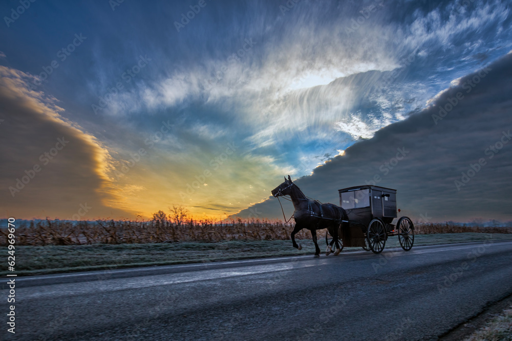 Amish buggy and cloud fronts in winter. Amish buggy and cloud fronts in winter.