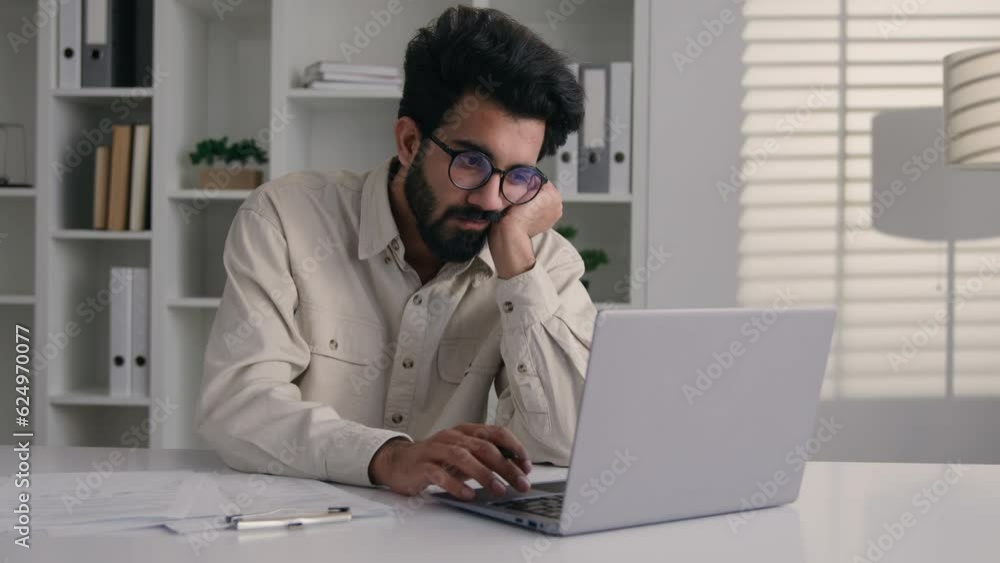 Tired Arabian muslim man overworked laptop remote job drowsy exhausted lazy Indian businessman ceo executive manager low energy monotone boring paperwork write business notes asleep overwork in office Tired Arabian muslim man overworked laptop remote job drowsy exhausted lazy Indian businessman ceo executive manager low energy monotone boring paperwork write business notes asleep overwork in office