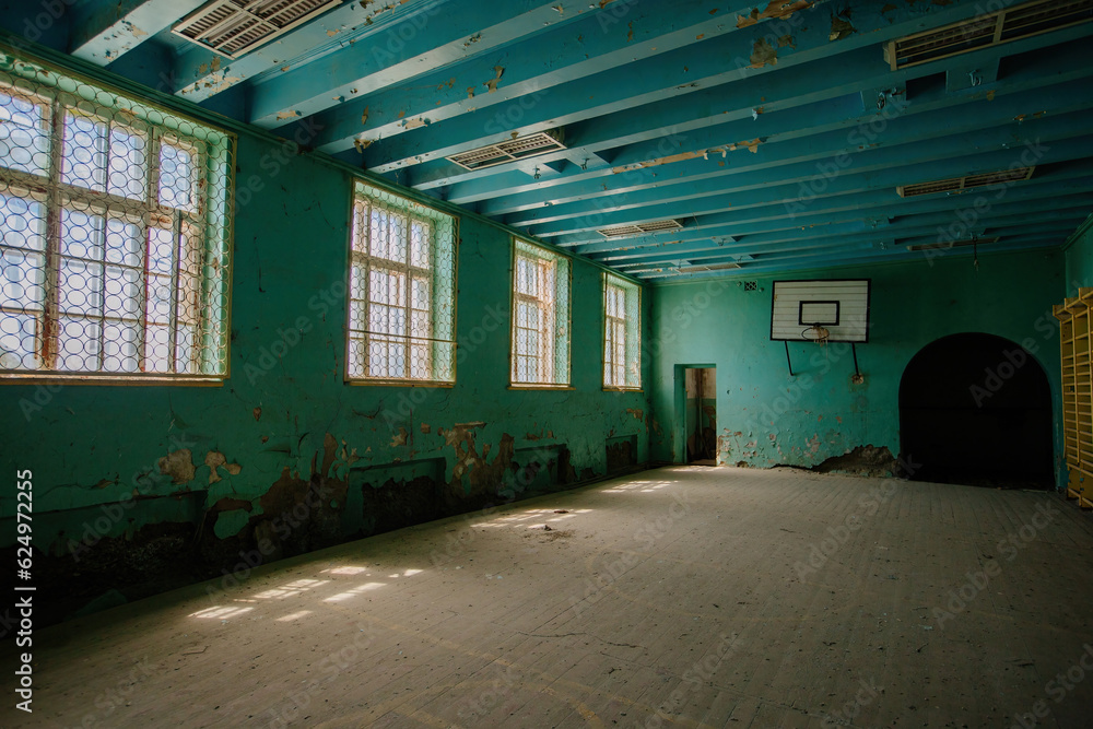Old gymnasium in abandoned school Old gymnasium in abandoned school