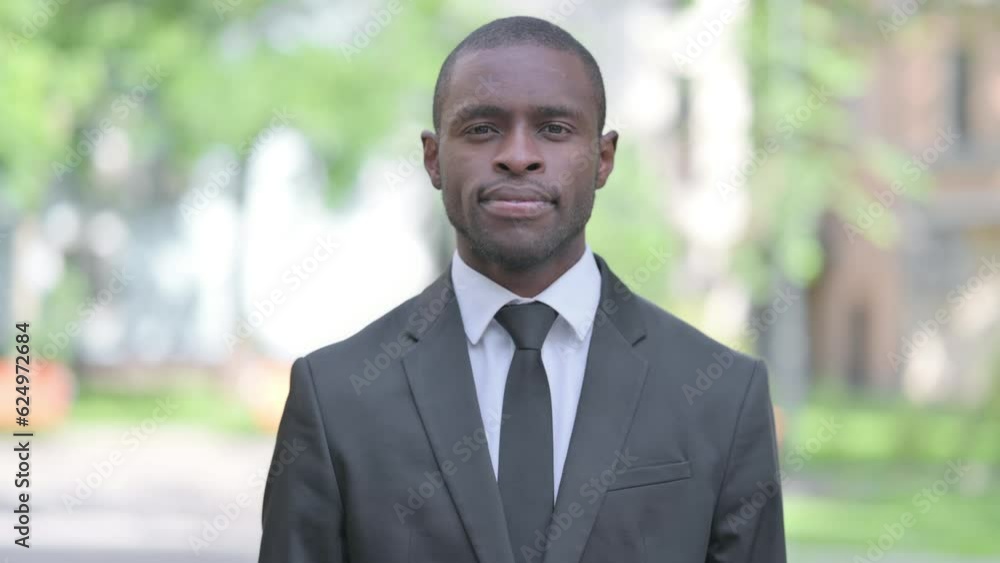 Outdoor Portrait of Serious African Businessman Outdoor Portrait of Serious African Businessman
