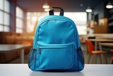 Blue school bag, classroom in background, bokeh background. Generative AI