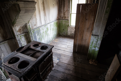 abandoned kitchen with stove