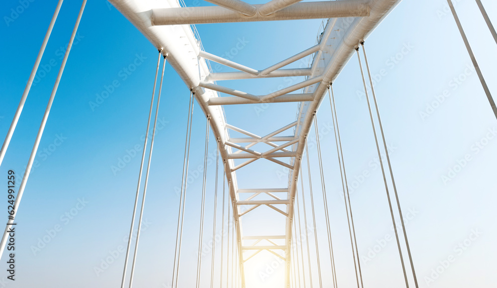 Naklejka premium Abstract view of bridge support against blue sky