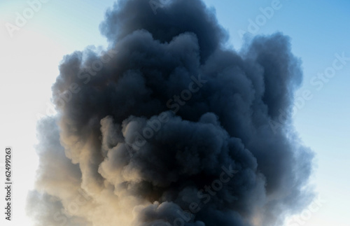 Thick dark smoke in a fire for background