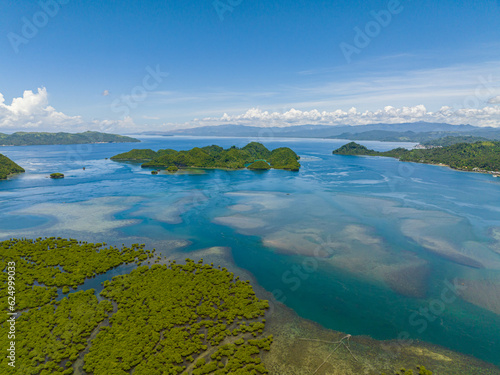 Tinago Island with turquoise water around. Seascape. Mindanao, Philippines.