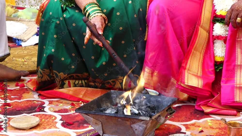 Marathi Rituals Worship with holy fire in marathi wedding. Drops in holy fire for ...