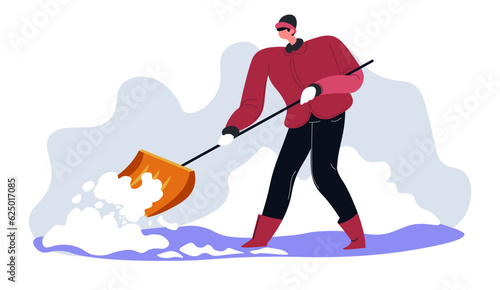 Man with wooden shovel cleaning snow in winter