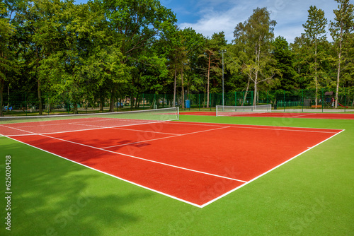 Tennis court in a forest park © wajan