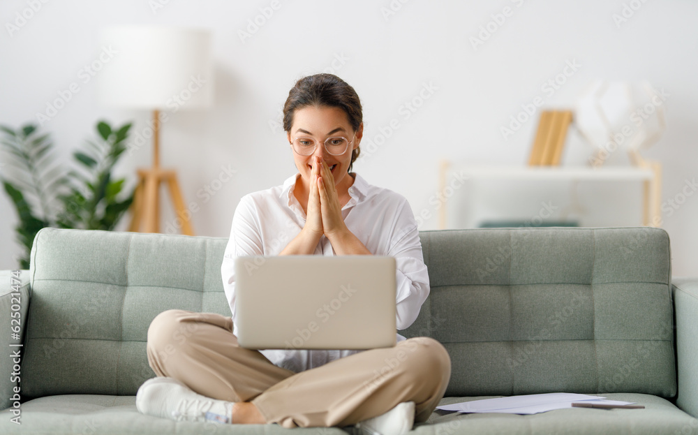 woman working on laptop at home woman working on laptop at home