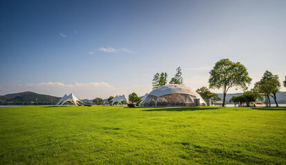 Tents for camping on the lawn on a sunny day, travel theme.