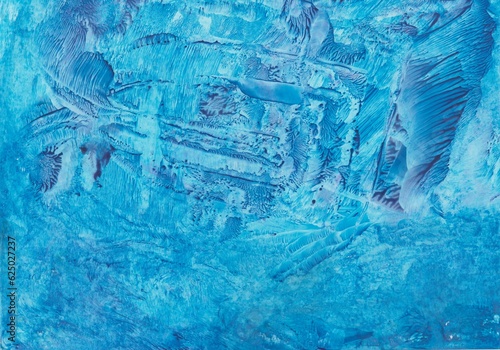 With the painting iron painted encaustic in blue with abstract pattern