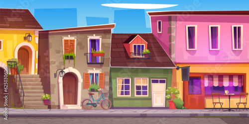 Old Italian town street with cafe. Vector cartoon illustration of traditional European architecture, stone paved road, houses with balconies and shutters on windows decorated with flowers, sunny day © klyaksun