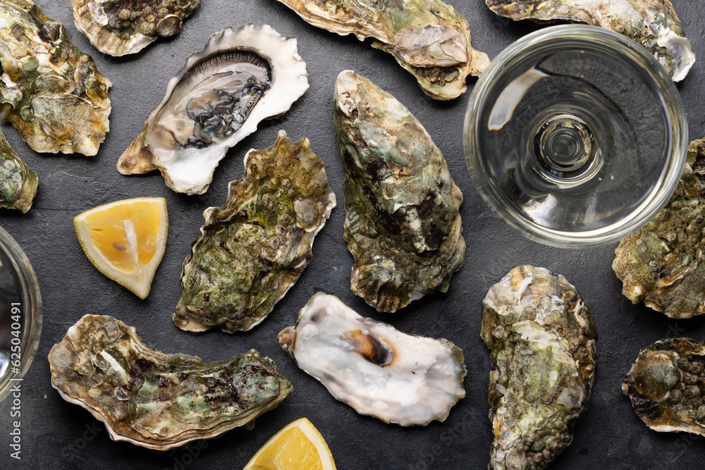 Fresh oysters with glasses of sparkling wine Fresh oysters with glasses of sparkling wine
