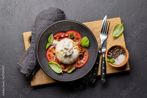 Burrata cheese, tomatoes and basil