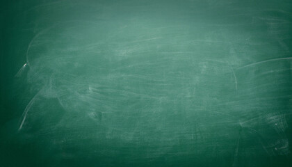 Texture of chalk on green blackboard or chalkboard background. School education board, dark wall backdrop or learning concept.