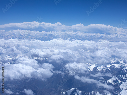sky and snow covered mountains