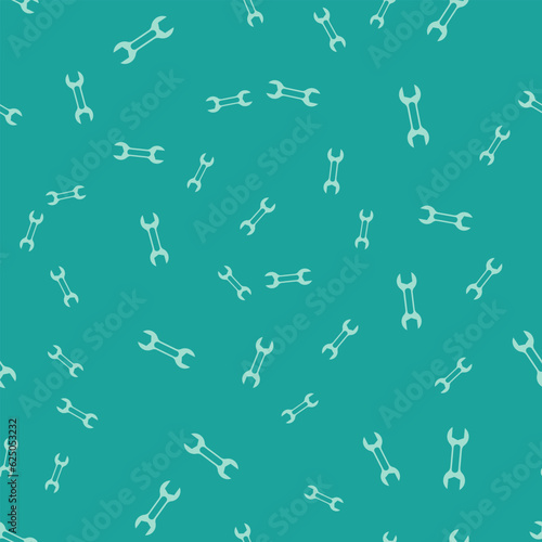 Green Wrench spanner icon isolated seamless pattern on green background. Vector