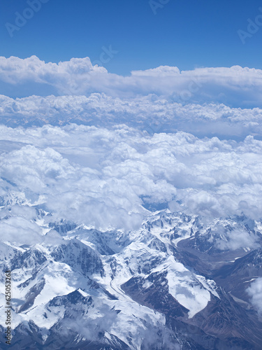 sky and snow covered mountains