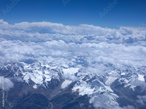 sky and snow covered mountains