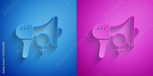 Paper cut Female movement, feminist activist with banner and placards icon isolated on blue and purple background. Feminist rights movement, feminism sisterhood. Paper art style. Vector
