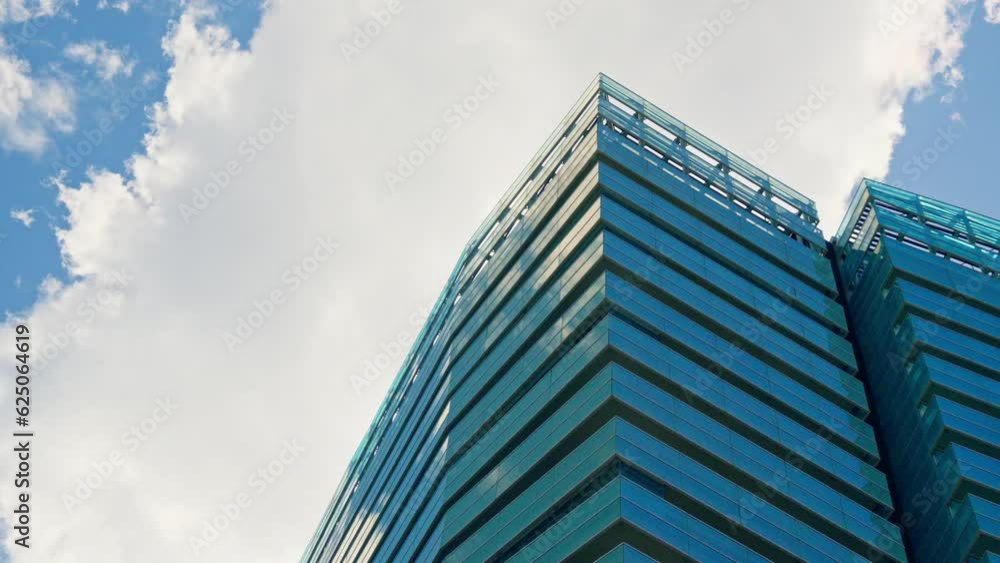 Towering skyscraper against a stunning sky backdrop Towering skyscraper against a stunning sky backdrop