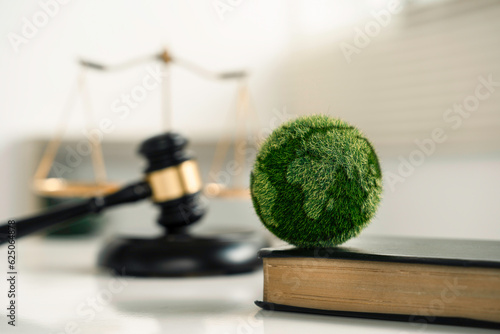 Cuadro en lienzo world and wooden gavel with a golden scale for law international environmental concept of business corporate and industry