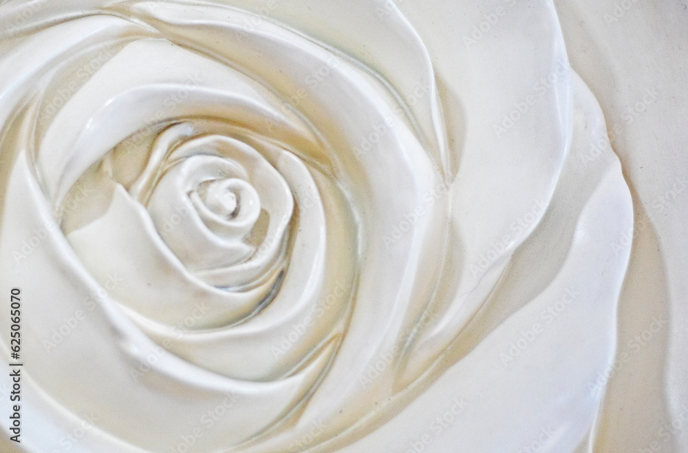 abstract light background of the core of a rose flower molded from clay. interior decoration abstract light background of the core of a rose flower molded from clay. interior decoration