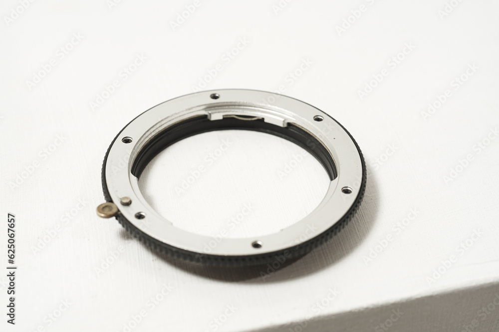 Lens adapter closeup isolated on white Lens adapter closeup isolated on white