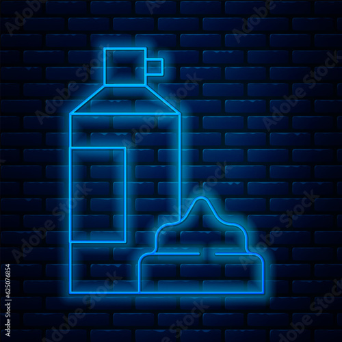Glowing neon line Whipped cream in an aerosol can icon isolated on brick wall background. Sweet dairy product. Milk product and sweet symbol. Vector