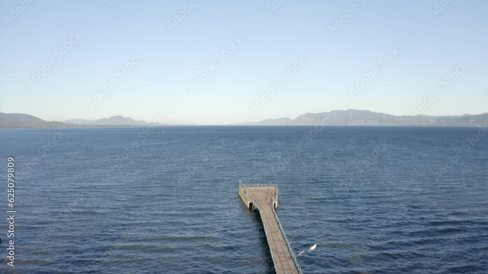 Aerial slowly orbits empty fan shaped concrete pier in Aegean Sea Aerial slowly orbits empty fan shaped concrete pier in Aegean Sea