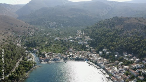 Aerial tilts down to Aegean waterfront bay in Lagkada on Chios Greece photo