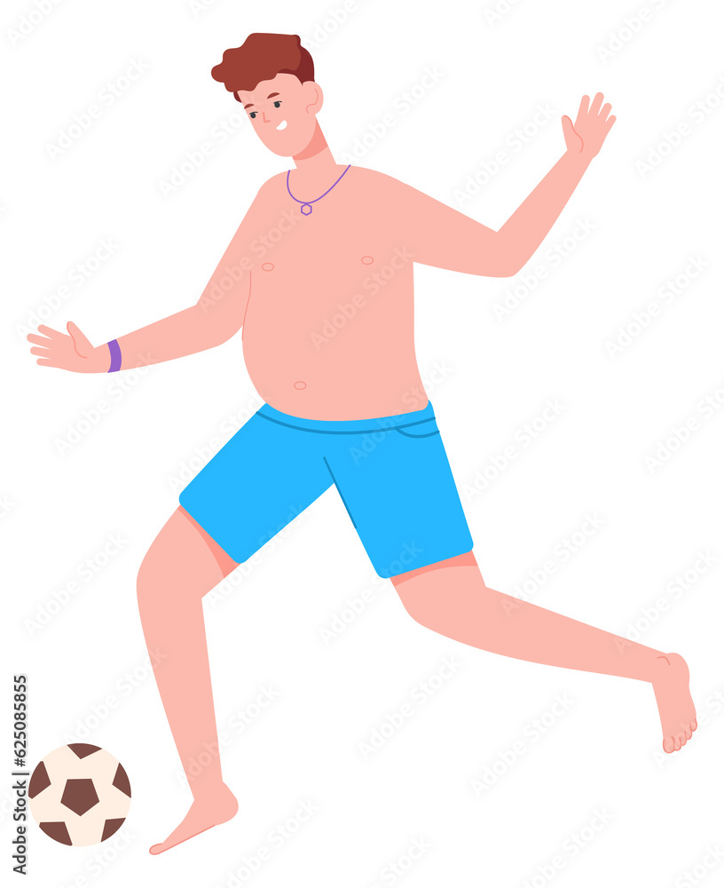Young man in shorts kicking soccer ball