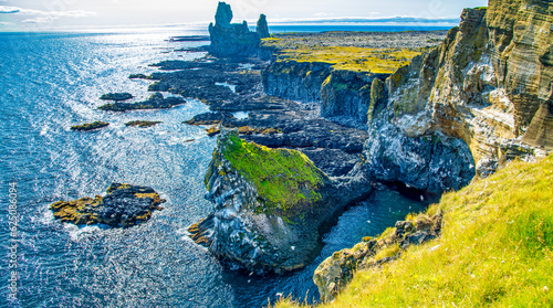 Beautiful coastline and rock formations in Londrangar, Iceland photo