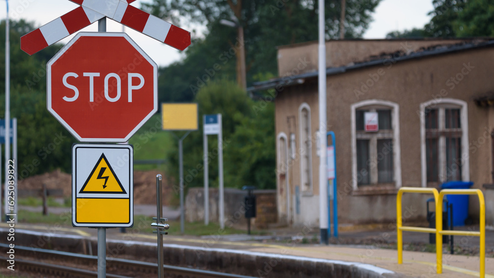 SIGN STOP - A red mark on a railway crossing
