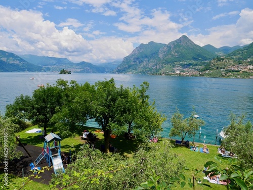 Spiagga pubblica Carzano on Monte Isola in Lago d'Iseo, Lombardy, Italy. photo