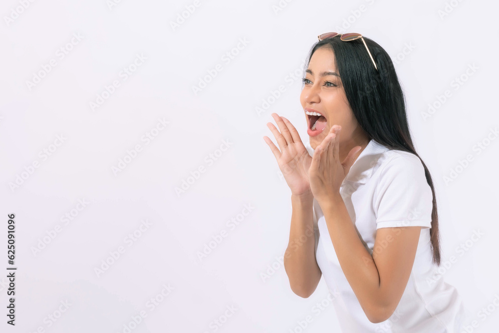 beautiful Asian business young woman screams announce the good news or promotion , holding hands near her face with open mouth Herald news promotion on white background beautiful Asian business young woman screams announce the good news or promotion , holding hands near her face with open mouth Herald news promotion on white background