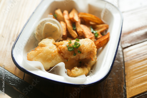 Traditional fish and chips with sauce