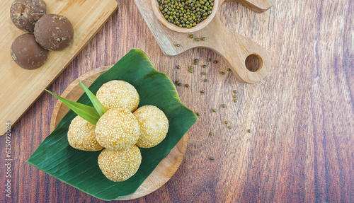 Sesame seed balls or onde onde is a traditional food from Indonesia made of glutinous rice flour green beans sesame seeds brown sugar served in a plate