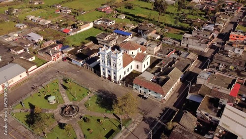 Aerial orbital shot from left to right in 4k format of the central church of Tucuso in the city of Machachi, Pichincha Ecuador