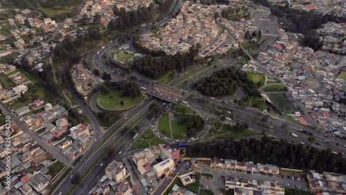 4k aerial shot of the general rumiñahui avenue interchange in the city of Quito, Pichincha Ecuador, in the afternoon hours, showing the flow of traffic on the avenue.