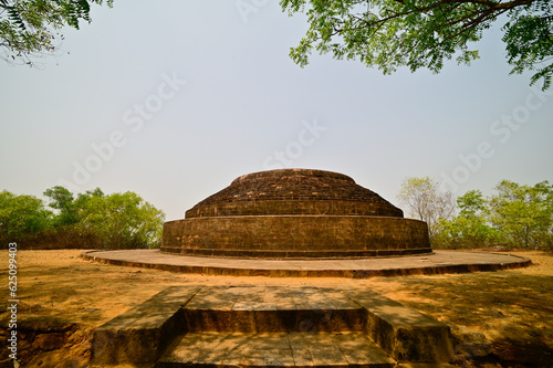  Ancient Grand Buddhist stupa built in stone and brick found in archaeological excavation at Lalitgiri Buddhist excavation site, Odisha, India.