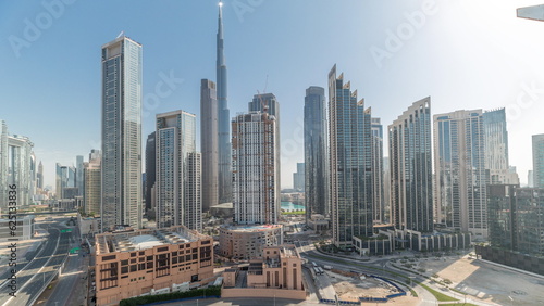 Aerial view of Dubai Downtown skyline with many towers timelapse.