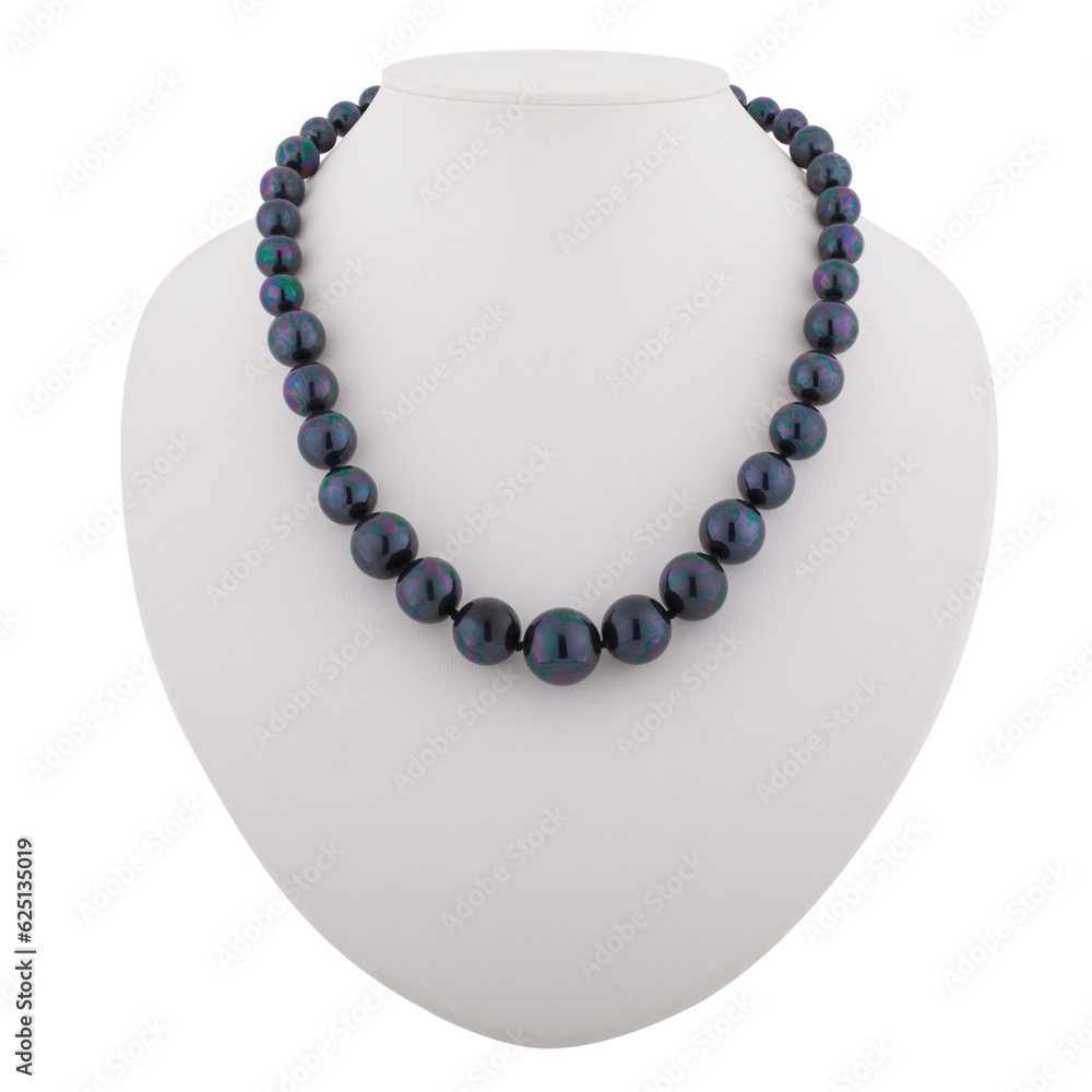 Dark mineral necklace on a white mannequin Dark mineral necklace on a white mannequin