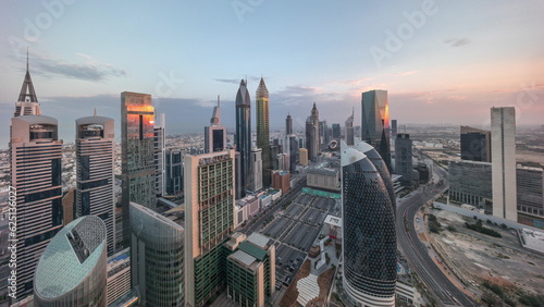 Skyline view of the high-rise buildings on Sheikh Zayed Road in Dubai aerial all day timelapse, UAE.